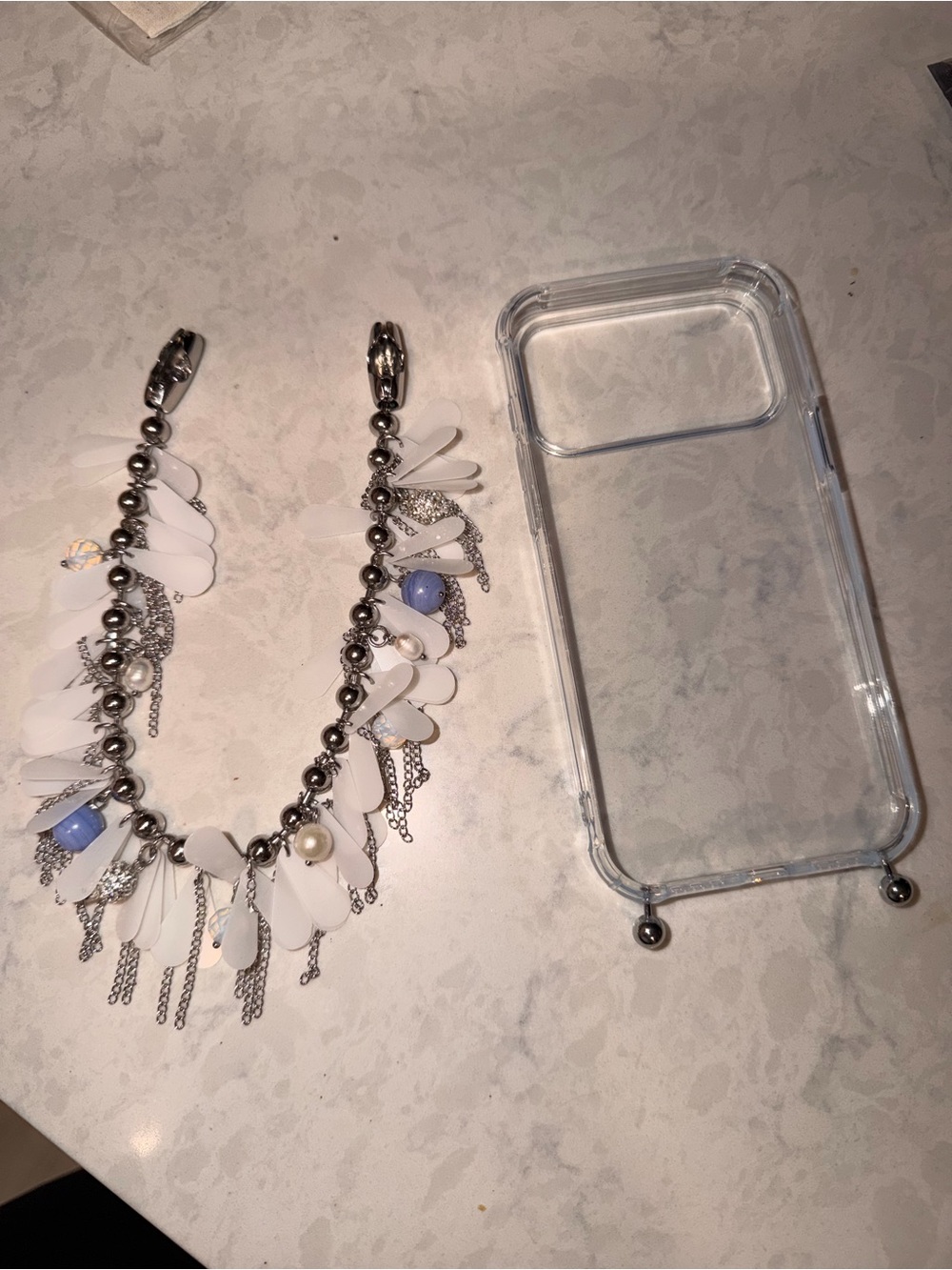 Ossa iPhone 17 Pro Max Case with Frosted Blue Bead Chain Wristlet